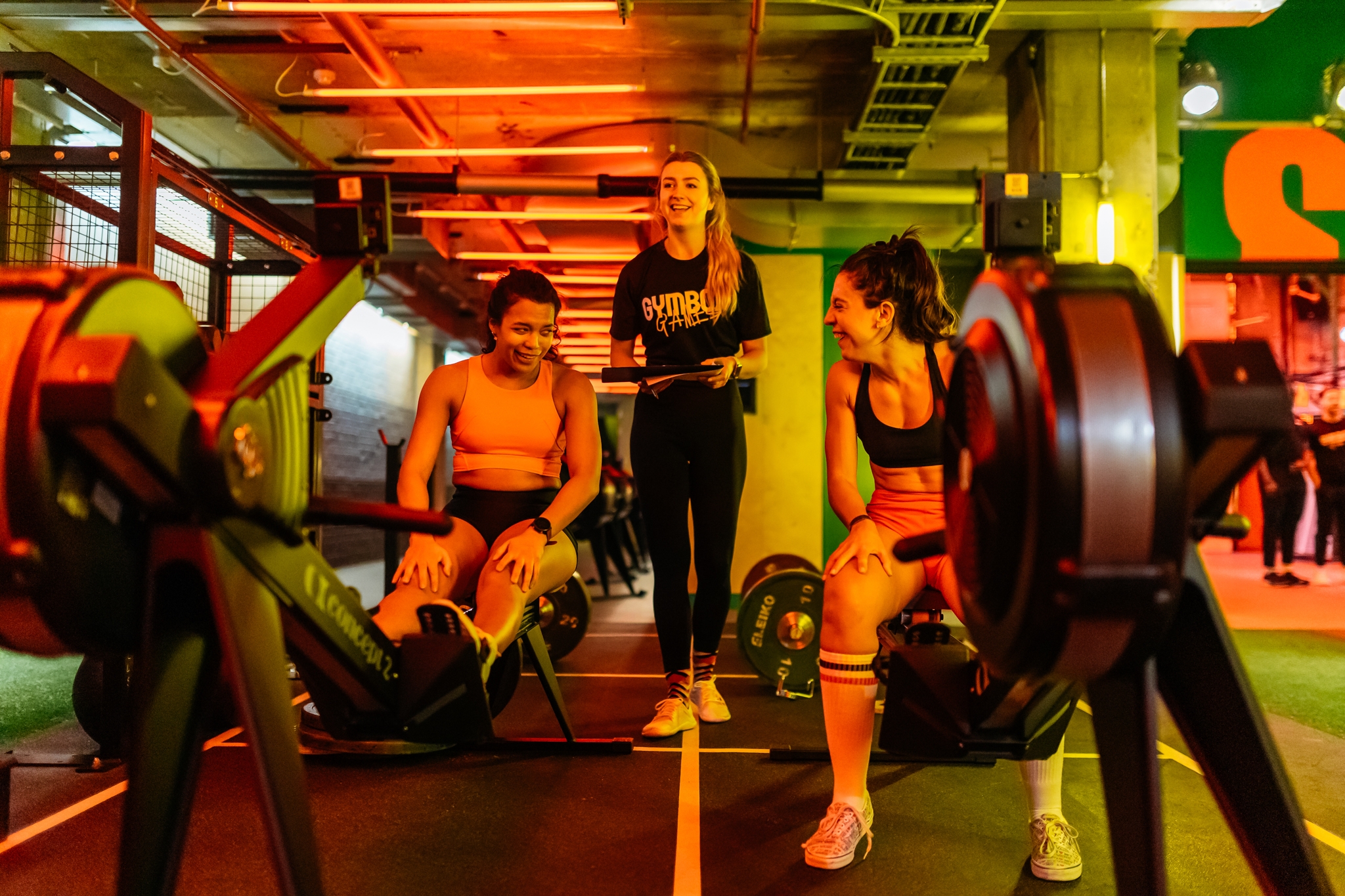 Gymbox Corporate Wellness. Two friends training together