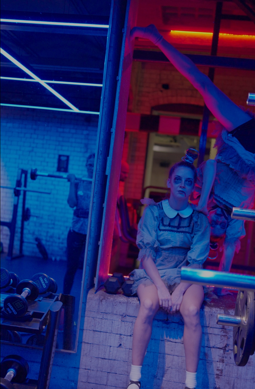 trick or treat - people in facy dress pose in gym