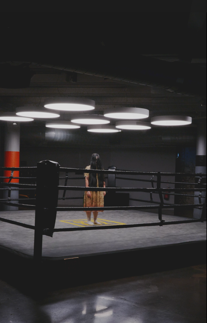 trick or treat - girl in zomebie outfit in boxing ring